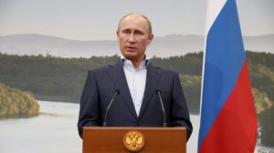 Russian President Vladimir Putin speaks during a media conference after a G-8 summit at the Lough Erne golf resort in Enniskillen, Northern Ireland, on Tuesday, June 18, 2013. The final day of the G-8 summit of wealthy nations is ending with discussions on globe-trotting corporate tax dodgers, a lunch with leaders from Africa, and suspense over whether Russia and Western leaders can avoid diplomatic fireworks over their deadlock on Syria’s civil war. (AP Photo/Matt Dunham, Pool)